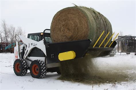 skid steer round bale unroller|skid steer round bale processor.